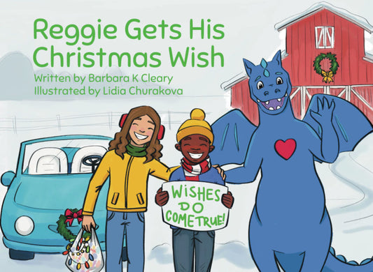 Children's book cover titled 'Reggie Gets His Christmas Wish' showing an illustrated snowy winter scene with Maddie in a yellow jacket, Reggie holding a sign that says 'WISHES DO COME TRUE!', and Zobie, the blue dragon with a red heart on his, chest standing beside them. The background includes a red barn, wreath, and blue car.